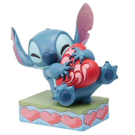 Enesco - Disney Tradition by Jim Shore - Lilo y Stich - Stitch abrazando un corazón