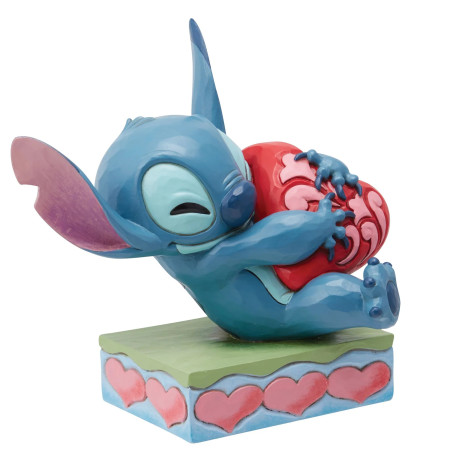 Enesco - Disney Tradition by Jim Shore - Lilo y Stich - Stitch abrazando un corazón