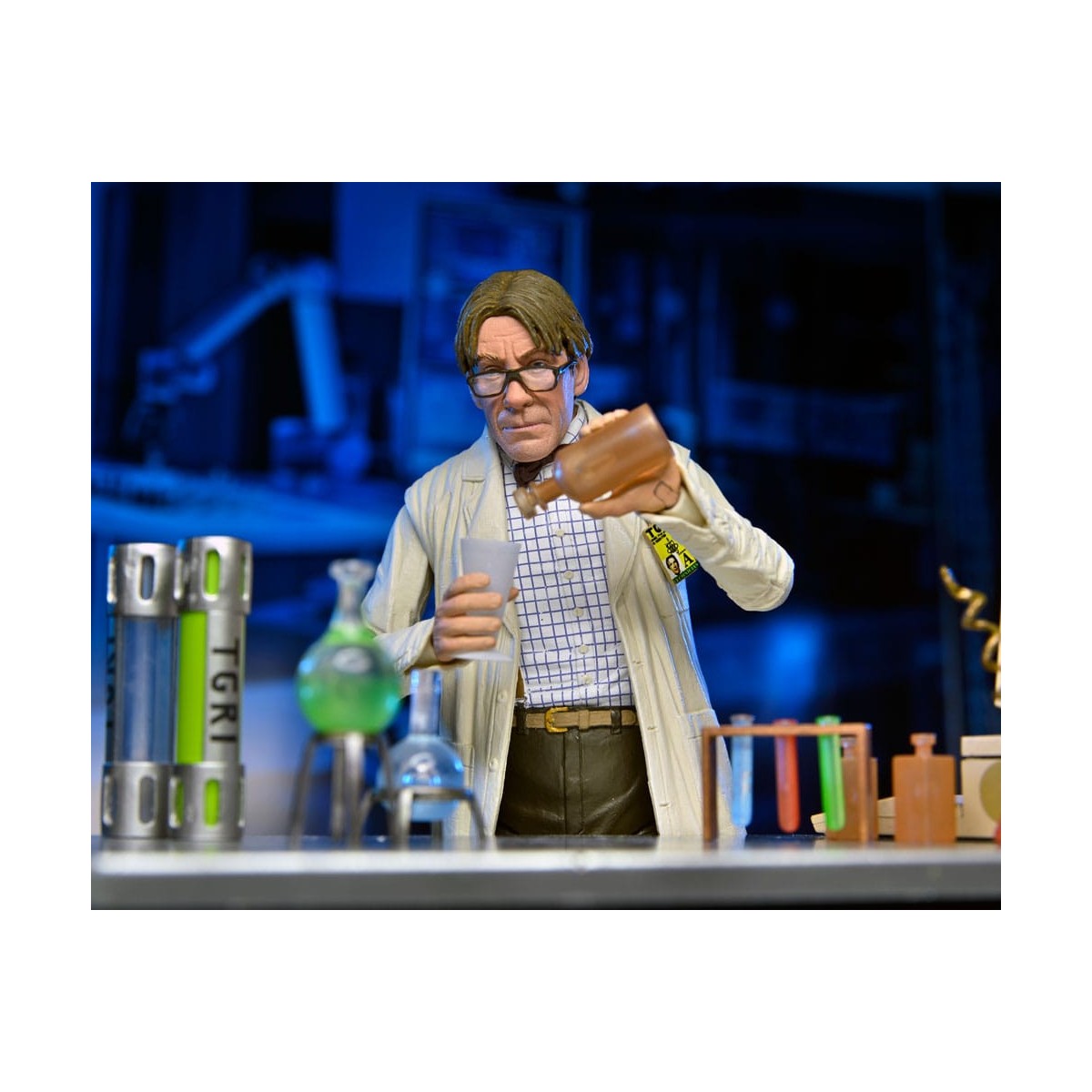 Neca - Profesor Perry con bata de laboratorio y Profesor Perry con traje para materiales peligrosos