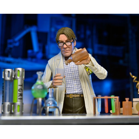 Neca - Profesor Perry con bata de laboratorio y Profesor Perry con traje para materiales peligrosos