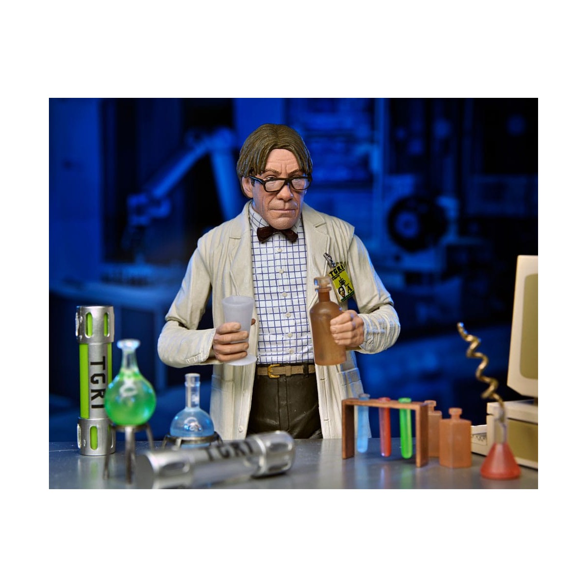 Neca - Profesor Perry con bata de laboratorio y Profesor Perry con traje para materiales peligrosos
