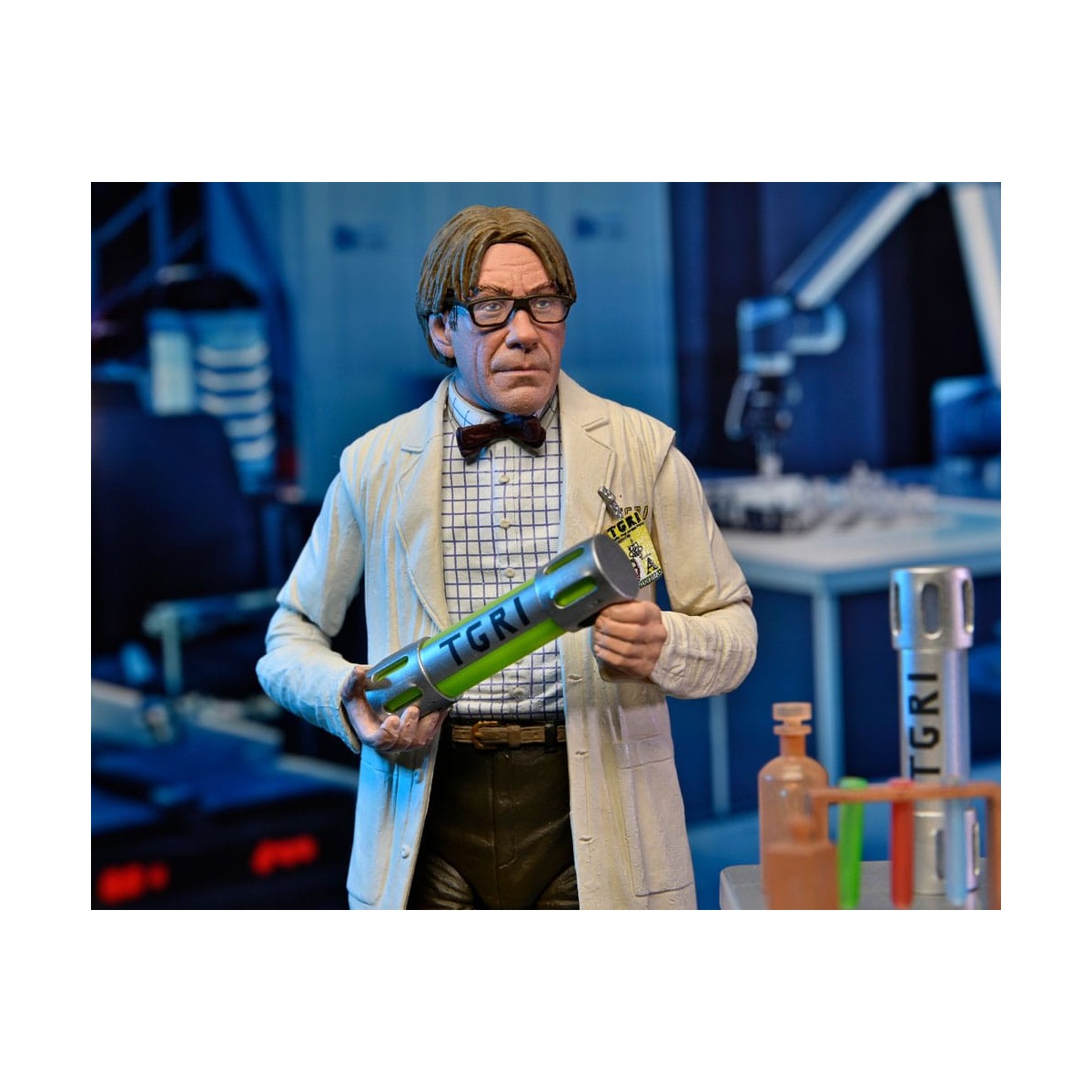 Neca - Profesor Perry con bata de laboratorio y Profesor Perry con traje para materiales peligrosos