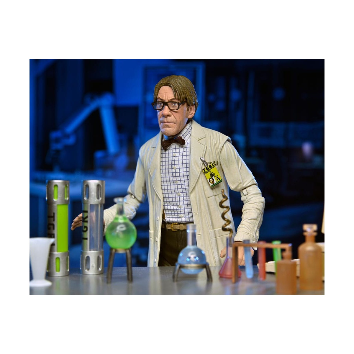 Neca - Profesor Perry con bata de laboratorio y Profesor Perry con traje para materiales peligrosos