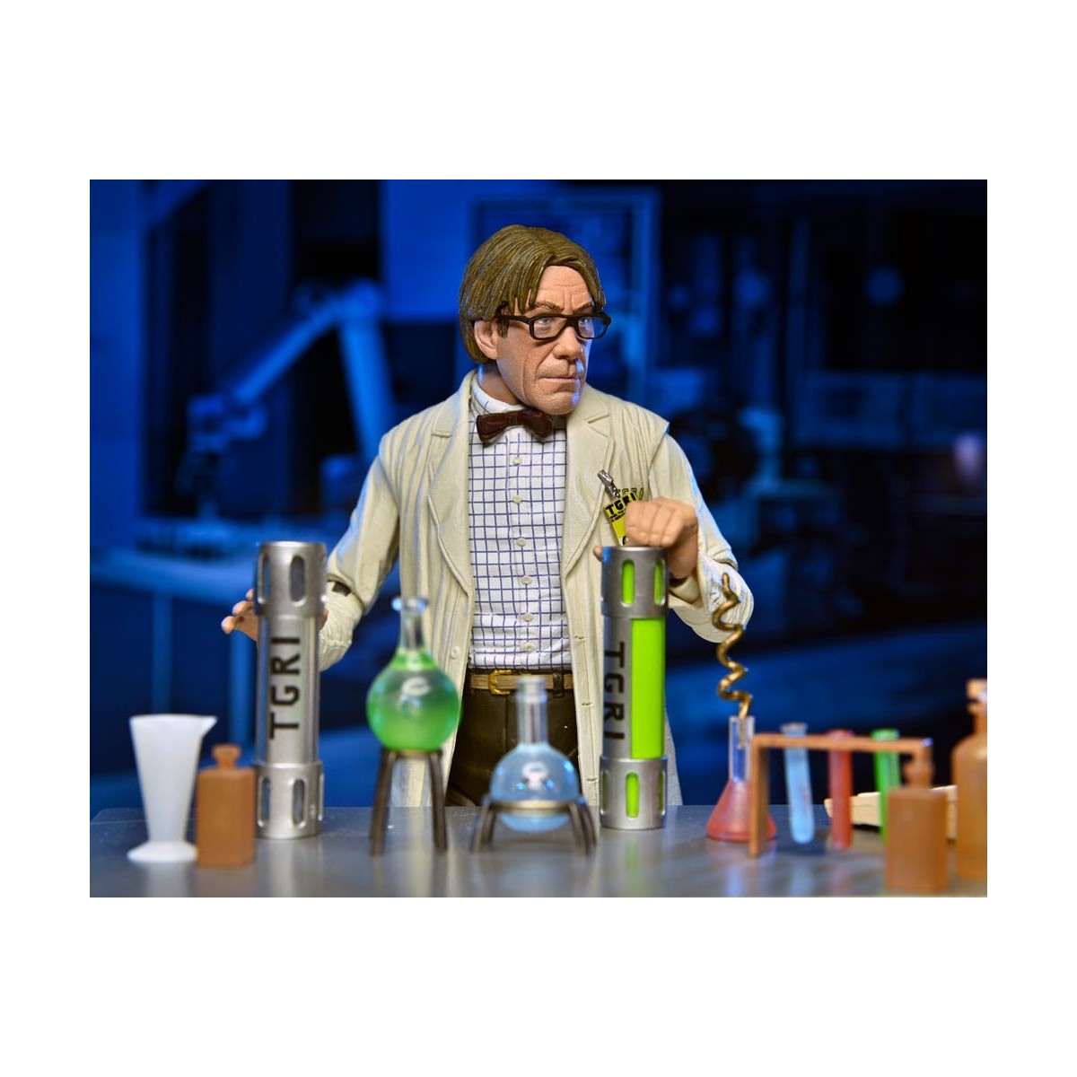 Neca - Profesor Perry con bata de laboratorio y Profesor Perry con traje para materiales peligrosos