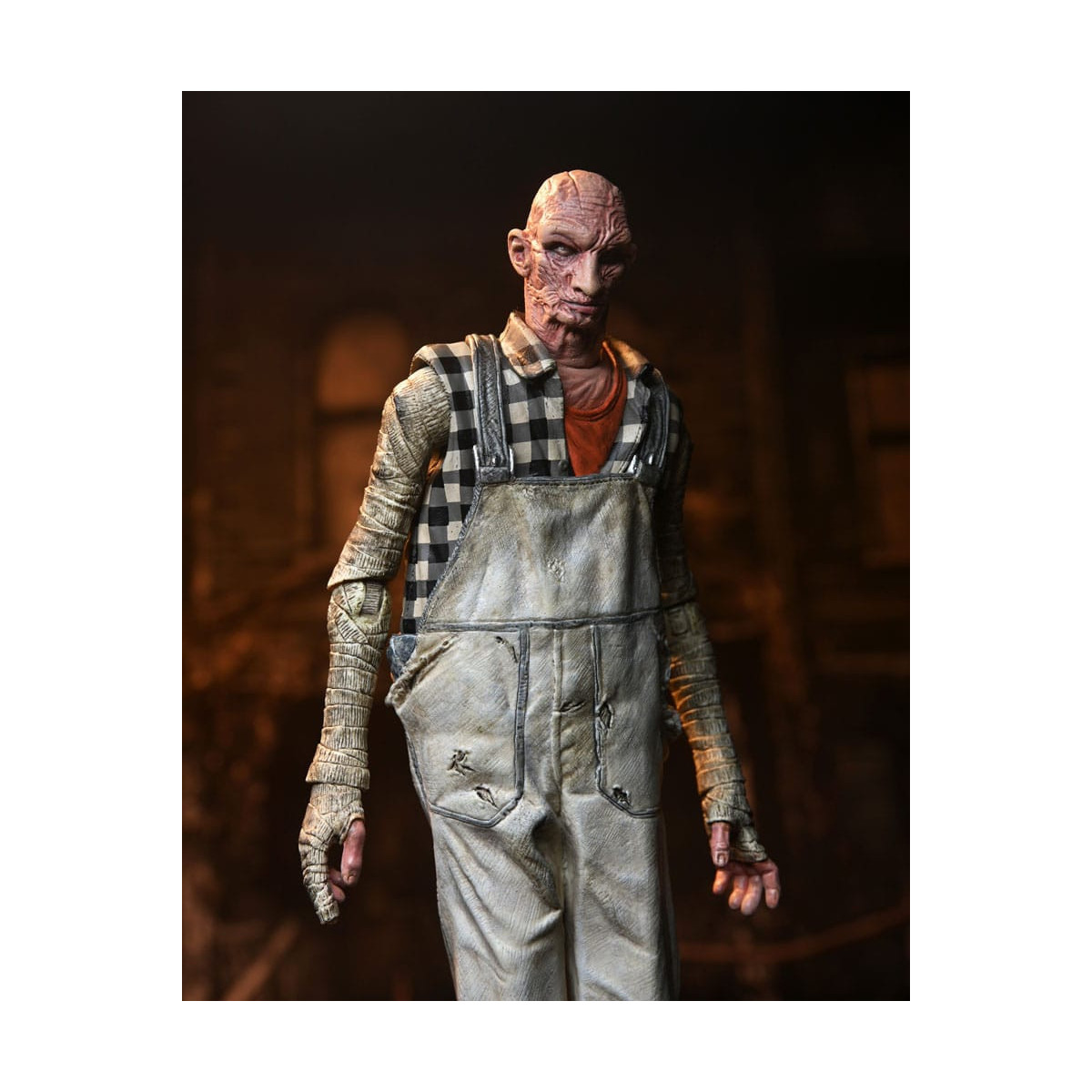 Neca 20 aniversario de The Devil's Rejects - Handyman Tiny (Monos)