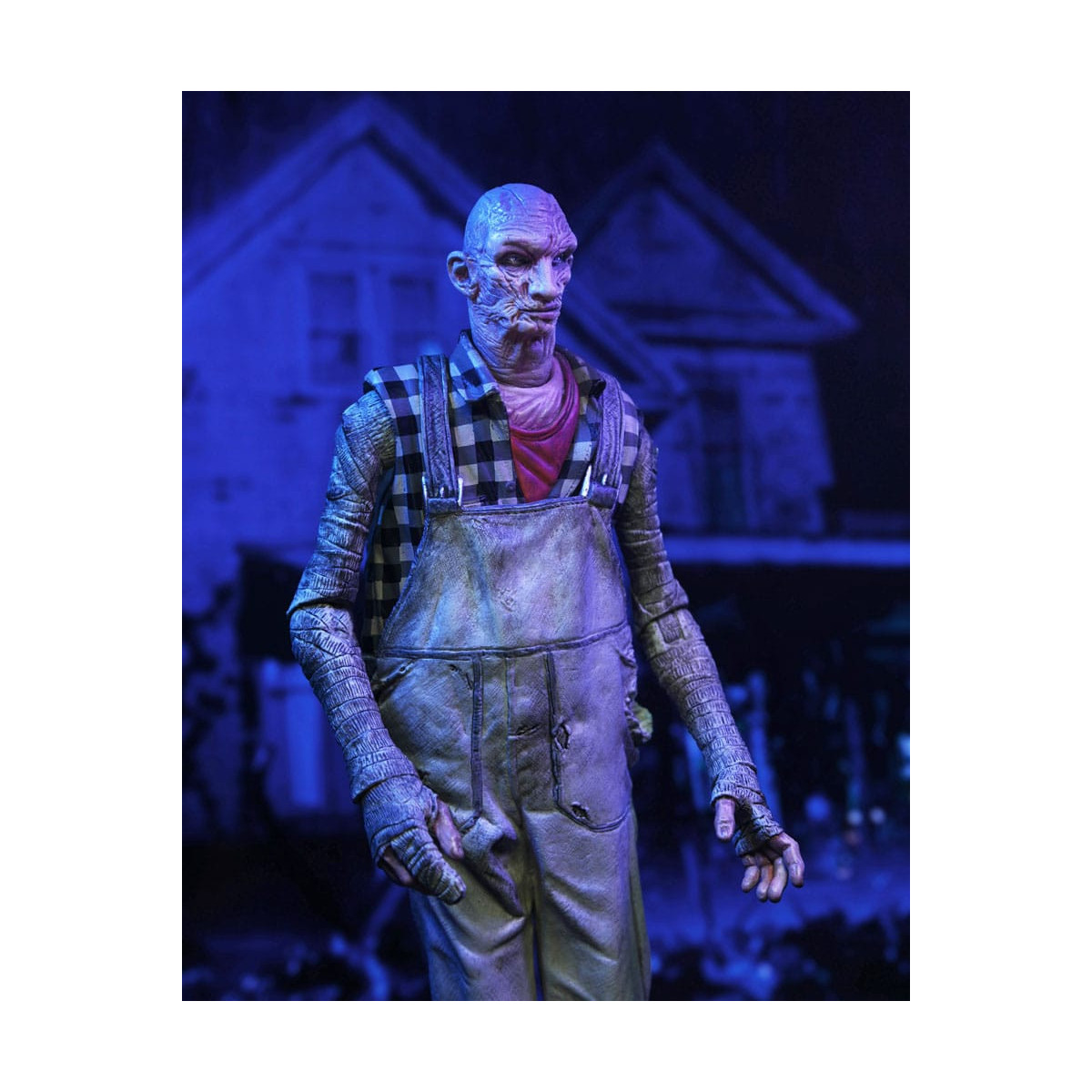 Neca 20 aniversario de The Devil's Rejects - Handyman Tiny (Monos)
