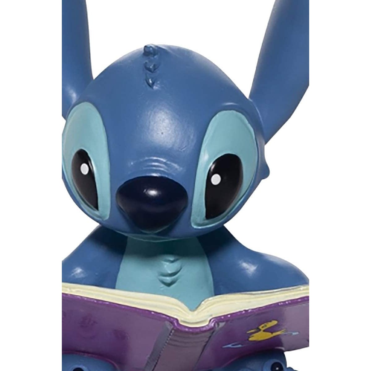 Disney Traditions Lilo y Stich - Stitch con un libro - 6cm