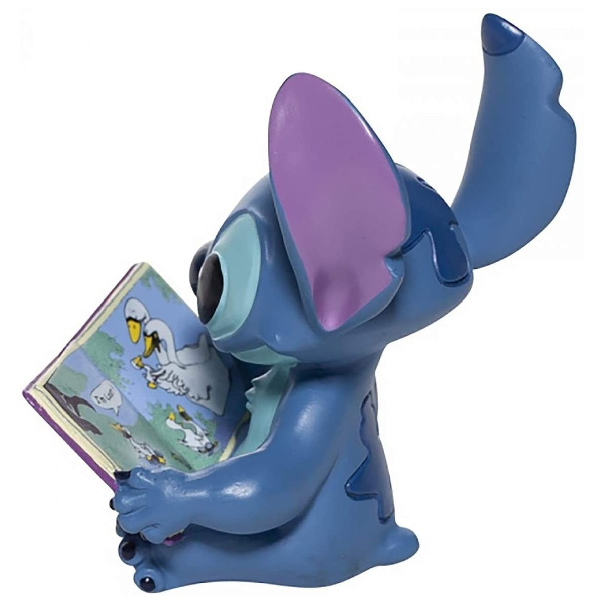 Disney Traditions Lilo y Stich - Stitch con un libro - 6cm