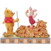 Enesco - Winnie the Pooh - Saltando al otoño - Tradición Disney por Jim Shore