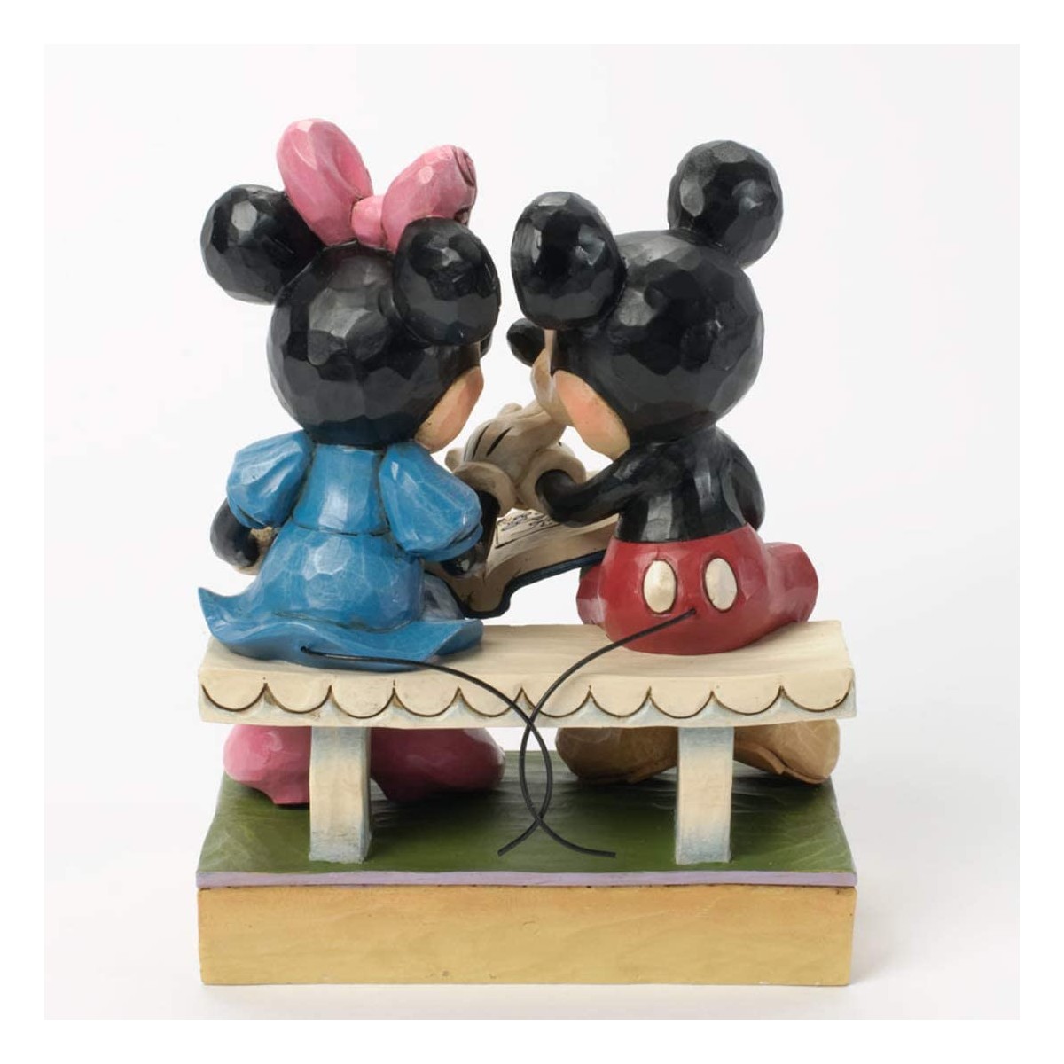 Enesco Disney Traditions - Mickey y Minnie hojeando un libro