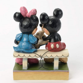 Enesco Disney Traditions - Mickey y Minnie hojeando un libro