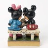 Enesco Disney Traditions - Mickey y Minnie hojeando un libro