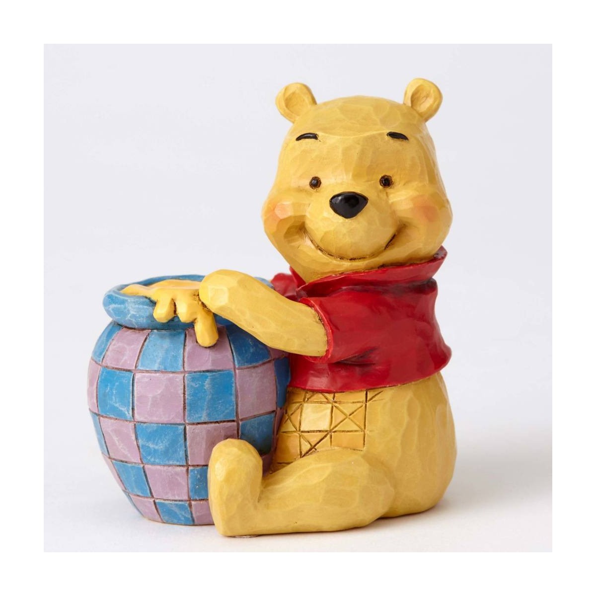 Enesco Disney Traditions - Winnie the Pooh y el tarro de miel