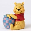 Enesco Disney Traditions - Winnie the Pooh y el tarro de miel