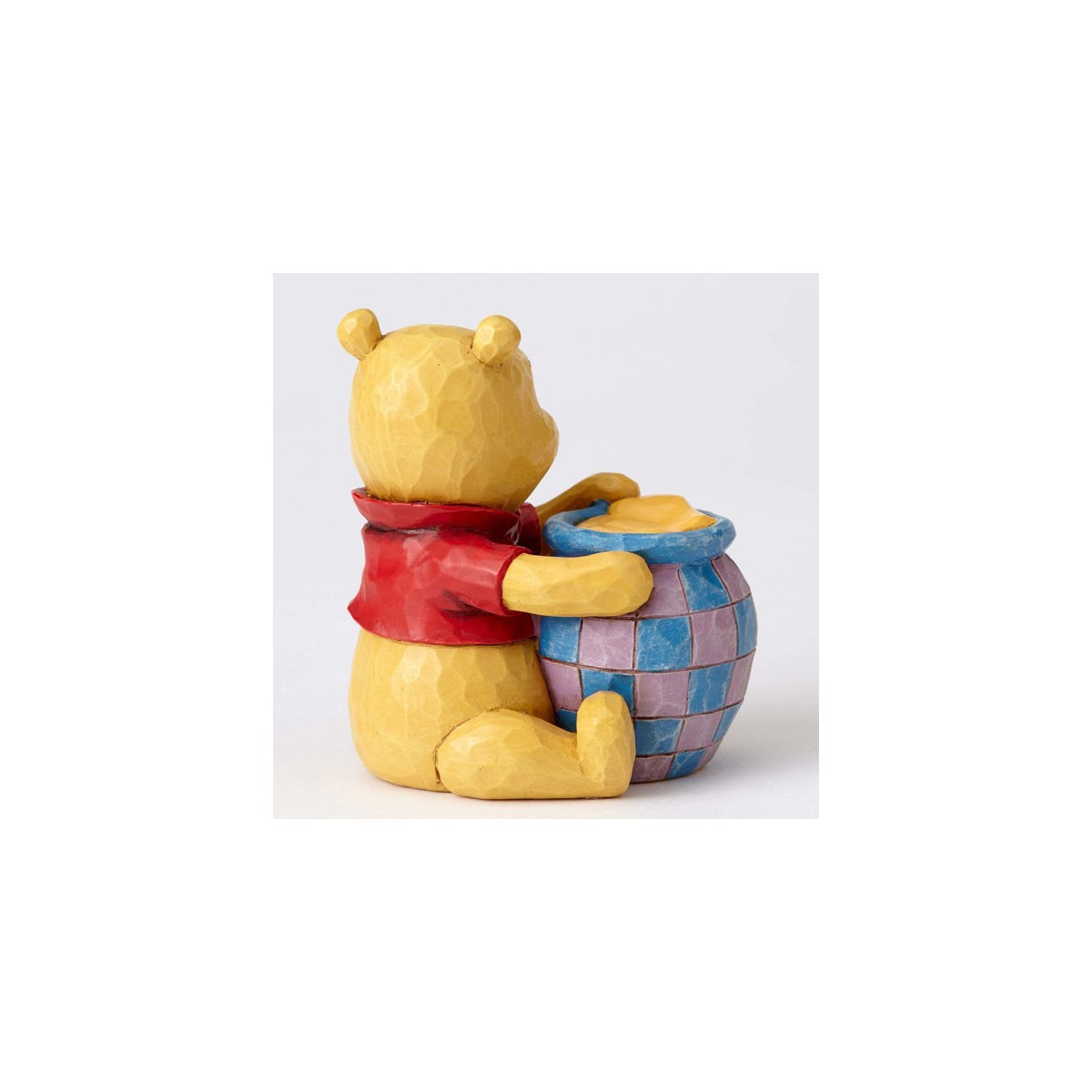 Enesco Disney Traditions - Winnie the Pooh y el tarro de miel