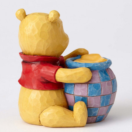 Enesco Disney Traditions - Winnie the Pooh y el tarro de miel