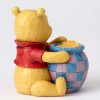 Enesco Disney Traditions - Winnie the Pooh y el tarro de miel